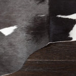 Safavieh Black and White Cowhide Indoor Rug