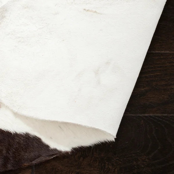 Safavieh Black and White Cowhide Indoor Rug