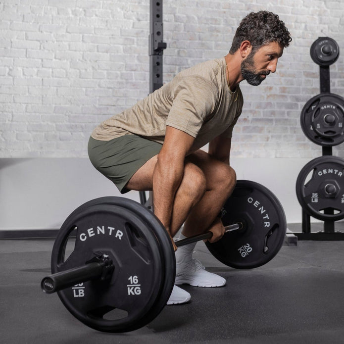 Centr 300 lb. Rubber Olympic Weight Set with 7’ Olympic bar and 3 Months Centr App