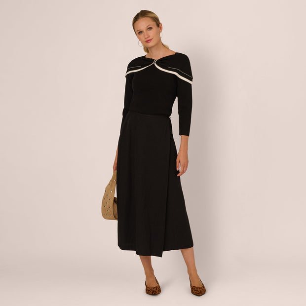 Off Shoulder Bow Collar Sweater In Black Ivory