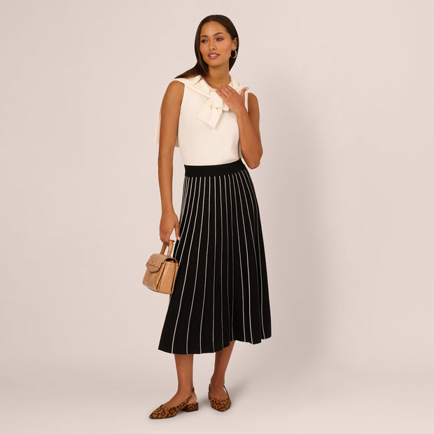 Pleated Pinstriped Knit Midi Skirt In Black Cream