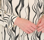 Long Sleeve Tie Neck Blouse In Ivory Black Abstract Brush