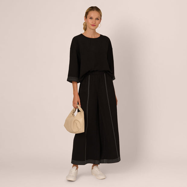 Three Quarter Sleeve Drop Shoulder Tie Waist Top In Black Ivory